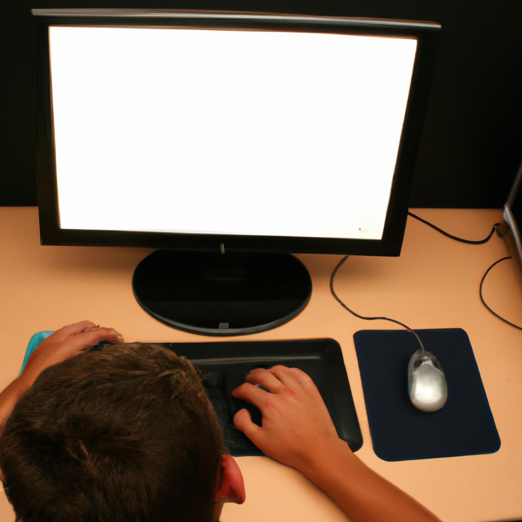 Person studying at computer desk